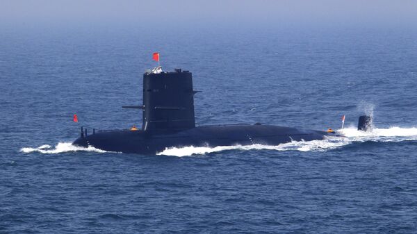  In this April 26, 2012 file photo released by China's Xinhua News Agency, Chinese navy's submarine attends the fleet review of the China-Russia joint naval exercise in the Yellow Sea - Sputnik International