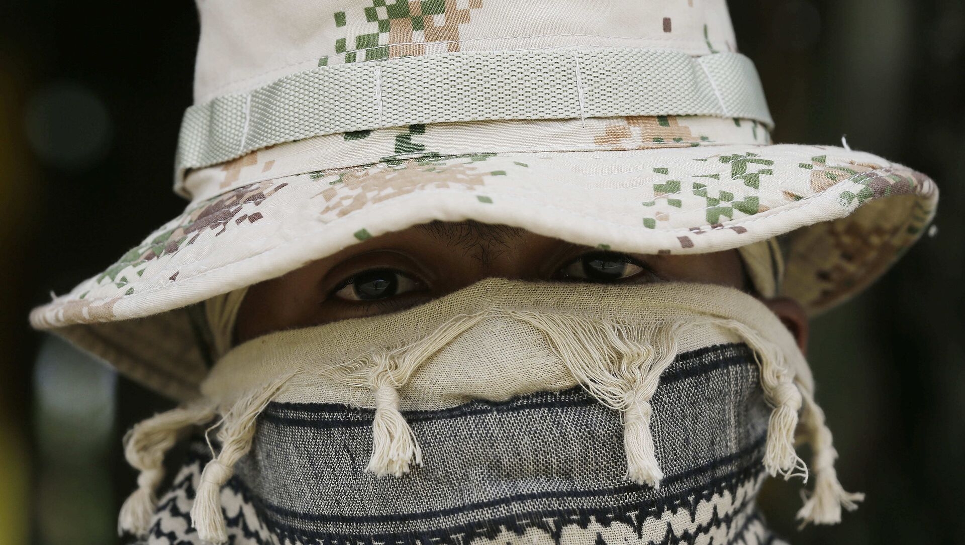 A Colombian Army Special Forces soldier waits to take part in a show of military exercises at the Tolemaida military base - Sputnik International, 1920, 28.07.2021