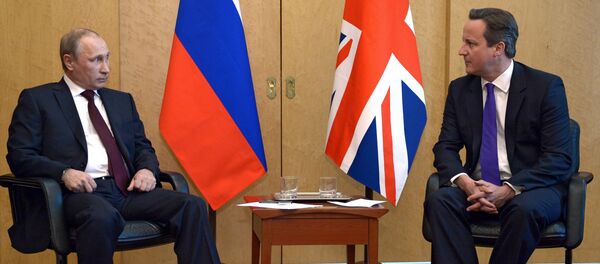Russia's President Vladimir Putin (L) speaks with Britain's Prime Minister David Cameron (R). Russia's President Vladimir Putin (L) speaks with Britain's Prime Minister David Cameron (R). - Sputnik International
