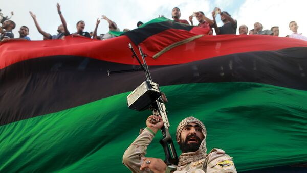 One of the members of the military protecting a demonstration against candidates for a national unity government proposed by U.N. envoy for Libya Bernardino Leon, is pictured in Benghazi, Libya October 23, 2015. - Sputnik International
