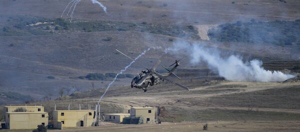 An helicopter takes part in the NATO's Trident Juncture Exercice at San Gregorio training ground near Zaragoza on November 4, 2015. - Sputnik International