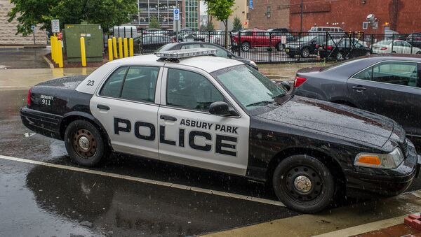 Police car in the rain, Asbury Park, New Jersey - Sputnik International