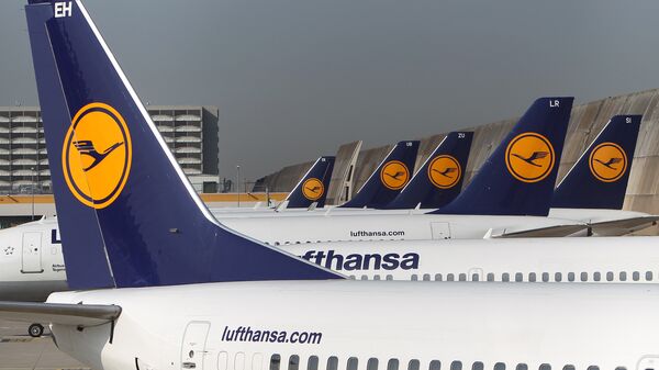 FILES - Aircrafts of German airline Lufthansa stand in park position at the airport in Frankfurt am Main, western Germany. - Sputnik International