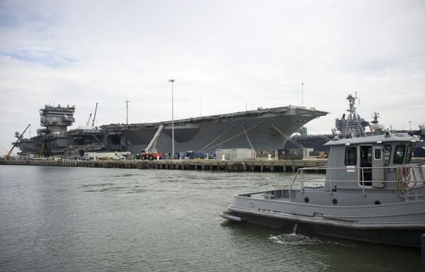 The Navy aircraft carrier USS Enterprise rests at the pier as it is gutted before being official decommissioned at Naval Station Norfolk in Norfolk, Virginia, May 8, 2013, during the Department of Defense's tour deemed Navy 101 The Navy aircraft carrier USS Enterprise rests at the pier as it is gutted before being official decommissioned at Naval Station Norfolk in Norfolk, Virginia, May 8, 2013, during the Department of Defense's tour deemed Navy 101 - Sputnik International