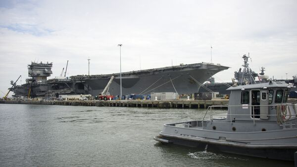 The Navy aircraft carrier USS Enterprise rests at the pier as it is gutted before being official decommissioned at Naval Station Norfolk in Norfolk, Virginia, May 8, 2013, during the Department of Defense's tour deemed Navy 101 - Sputnik International