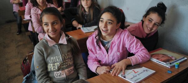 Girls at a school in Latakia studying the Russian language. Girls at a school in Latakia studying the Russian language. - Sputnik International