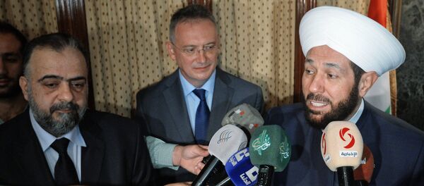 From right: the Grand Mufti of Syria, Ahmad Badreddin Hassoun; the extraordinary and plenipotentiary Russian ambassador in the Syrian Arab Republic, Alexander Kinshchak; the Minister of Awqaf, Mohammad Abdul Sattar al-Sayyed, during a meeting at the Russian embassy in Syria - Sputnik International