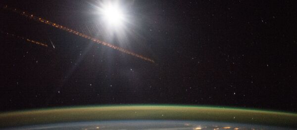 ESA (European Space Station) astronaut Samantha Cristoforetti on board the International Space Station Dec. 13th, 2014 took this night exposure of the Earth showing an Aurora with city lights over the Baltic countries of northern Europe and England. ESA (European Space Station) astronaut Samantha Cristoforetti on board the International Space Station Dec. 13th, 2014 took this night exposure of the Earth showing an Aurora with city lights over the Baltic countries of northern Europe and England. - Sputnik International