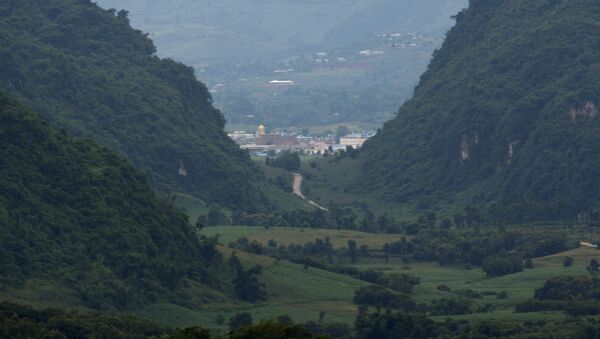 Myanmar's Kokang region seen from the Chinese side from a hill top observation pavilion in Nansan in southwestern China's Yunnan province. - Sputnik International
