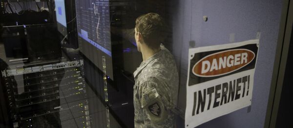 A United States Military Academy cadet checks computers at the Cyber Research Center at the United States Military Academy in West Point, N.Y., Wednesday, April 9, 2014 - Sputnik International