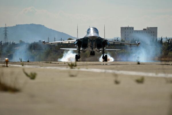 A multifunctional fighter-bomber Su-34 of the Russian Aerospace Forces lands at Hemeimeem air base in Syria A multifunctional fighter-bomber Su-34 of the Russian Aerospace Forces lands at Hemeimeem air base in Syria - Sputnik International