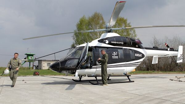The new Ansat, seen here at OAO Kazan Helicopter Plant's testing facility. - Sputnik International