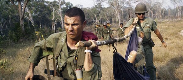 U. S. soldier giving first aid to the wounded in Vietnam in 1968 U. S. soldier giving first aid to the wounded in Vietnam in 1968 - Sputnik International