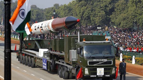 An Agni IV missile capable of carrying nuclear warhead and a range of 2,500-3,500 kilometers is displayed during the main Republic Day parade in New Delhi, India, Thursday, Jan. 26, 2012 - Sputnik International