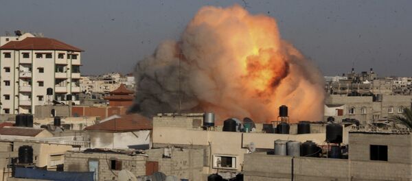 File photo of a ball of fire rises from an explosion following an Israeli air strike on the house in the southern Gaza Strip, Tuesday, Aug. 26, 2014 File photo of a ball of fire rises from an explosion following an Israeli air strike on the house in the southern Gaza Strip, Tuesday, Aug. 26, 2014 - Sputnik International