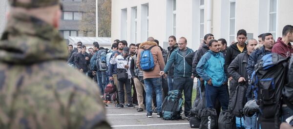 Asylum seekers queue up as they arrive at a refugee reception centre in the northern town of Tornio, Finland, on Friday Sept. 25, 2015 Asylum seekers queue up as they arrive at a refugee reception centre in the northern town of Tornio, Finland, on Friday Sept. 25, 2015 - Sputnik International