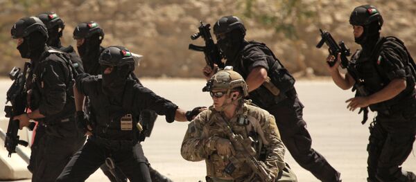 FILE - In this Thursday, June 20, 2013 photo, special operations forces from Iraq, Jordan and the U.S. conduct an exercise as part of Eager Lion multinational military maneuvers at the King Abdullah Special Operations Training Center (KASOTC) in Amman, Jordan FILE - In this Thursday, June 20, 2013 photo, special operations forces from Iraq, Jordan and the U.S. conduct an exercise as part of Eager Lion multinational military maneuvers at the King Abdullah Special Operations Training Center (KASOTC) in Amman, Jordan - Sputnik International