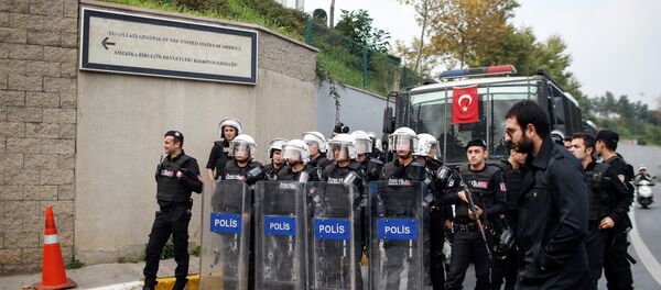 Riot police officers stand as members of Turkey Youth Union shout anti-US slogans as they protest against the upcoming visit of the US President Barack Obama to Turkey mid-November for G20 summit in Antalya, outside the US consulate in Istanbul, Turkey, Sunday, Nov. 8, 2015 Riot police officers stand as members of Turkey Youth Union shout anti-US slogans as they protest against the upcoming visit of the US President Barack Obama to Turkey mid-November for G20 summit in Antalya, outside the US consulate in Istanbul, Turkey, Sunday, Nov. 8, 2015 - Sputnik International