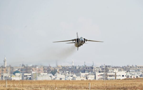 A MiG-23 aircraft of the Syrian Air Force lands at the Hama airbase near the city of Hama, Syria's Hama Province. - Sputnik International