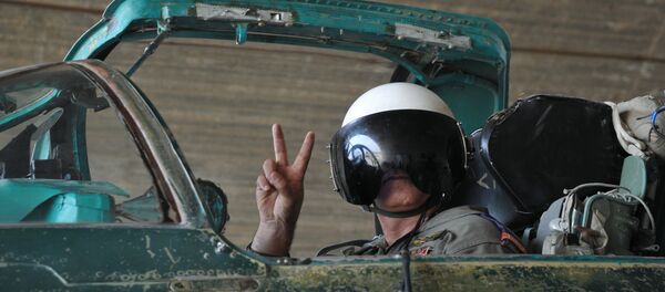 A Syrian pilot before a mission at the Hama airbase near the city of Hama, Syria's Hama Province. A Syrian pilot before a mission at the Hama airbase near the city of Hama, Syria's Hama Province. - Sputnik International