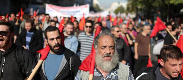 Members of the PAME Communist-affiliated union protest during a 24-hour nationwide general strike in Athens, Thursday, Nov. 12, 2015. - Sputnik International