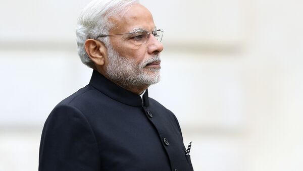 Indian Prime Minister Narendra Modi stands during a welcome ceremony outside the Treasury in London on November 12, 2015 on the first day of a three-day visit to Britain. - Sputnik International