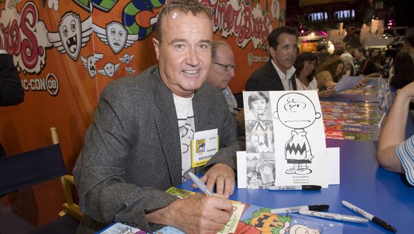 Peter Robbins, the original voice of Peanuts character Charlie Brown signs autographs at Comic Con in San Diego on Friday, July 25,2008. - Sputnik International