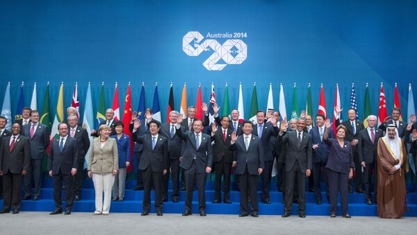 Leaders pose for a group photo at the G20 summit in Brisbane, Australia, Saturday, Nov. 15, 2014. - Sputnik International