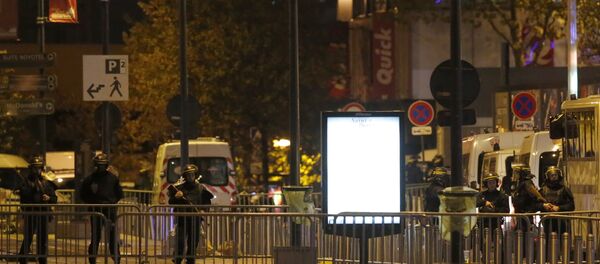 Police officers secure a street outside the Stade de France stadium after the international friendly soccer France against Germany, Friday, Nov. 13, 2015 in Saint Denis, outside Paris. Police officers secure a street outside the Stade de France stadium after the international friendly soccer France against Germany, Friday, Nov. 13, 2015 in Saint Denis, outside Paris. - Sputnik International