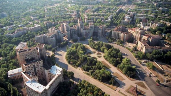 Freedom Square, Kharkiv, featuring the famed Soviet constructivist Derzhprom building, and the Lenin monument, the latter torn down in September, 2014. - Sputnik International