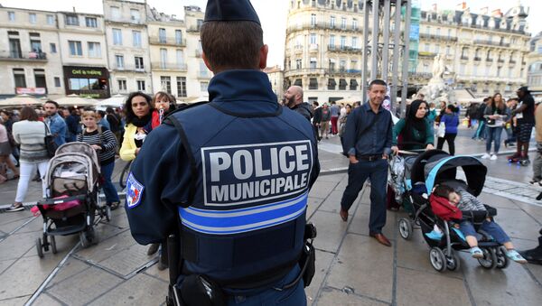 A police officer patrols in Montpellier on November 14, 2015, following a series of coordinated attacks in and around Paris late on November 13 - Sputnik International
