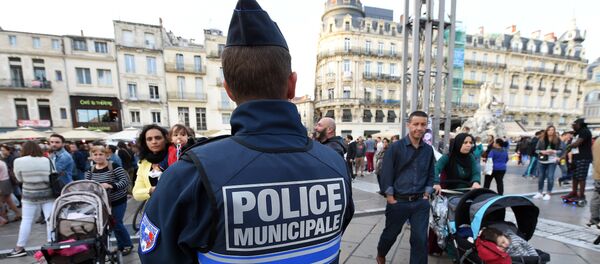 A police officer patrols in Montpellier on November 14, 2015, following a series of coordinated attacks in and around Paris late on November 13 - Sputnik International