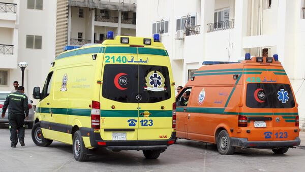 Ambulances carrying some dead migrants are seen in front of the hospital at Al Arish city, in the northern part of Sinai peninsula, Egypt, November 15, 2015 - Sputnik International