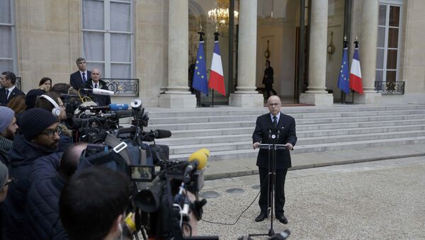 French Interior Minister Bernard Cazeneuve delivers a statement in the courtyard of the Elysee Palace in Paris, France, November 14, 2015, after an extraordinary ministers' meeting, the day after a series of deadly attacks in Paris - Sputnik International