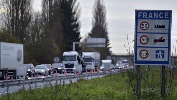 A view shows vehicles queueing in the highway from Paris to Brussels as Belgian and French police officers control the crossing of vehicles on the border between the two countries, following the deadly Paris attacks, in Crespin, France, November 14, 2015 - Sputnik International