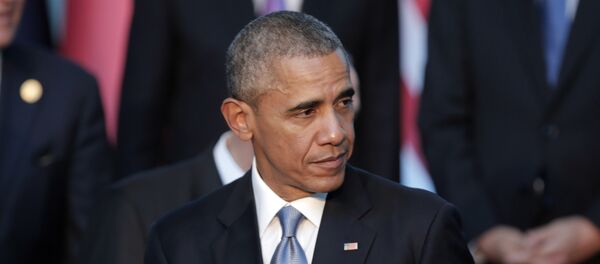 President Barack Obama leaves after posing for a family photo at the G-20 summit in Antalya, Turkey, Sunday, Nov. 15, 2015 - Sputnik International