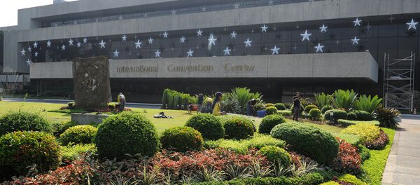 Policemen ride their motorcycles past the Philippine International Convention Center, the main venue of the Asia-Pacific Economic Cooperation (APEC) summit which will be held next week, in Manila, in this file picture taken November 15, 2015 - Sputnik International