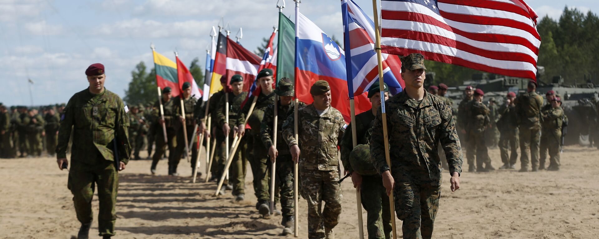Soldiers from NATO countries attend an opening ceremony of military exercise 'Saber Strike 2015', at the Gaiziunu Training Range in Pabrade some 60km.(38 miles) north of the capital Vilnius, Lithuania, Monday, June 8, 2015 - Sputnik International, 1920, 26.02.2022