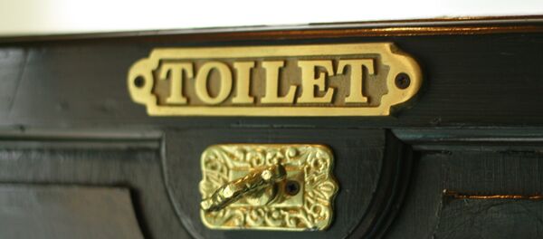 Toilet sign - Sputnik International