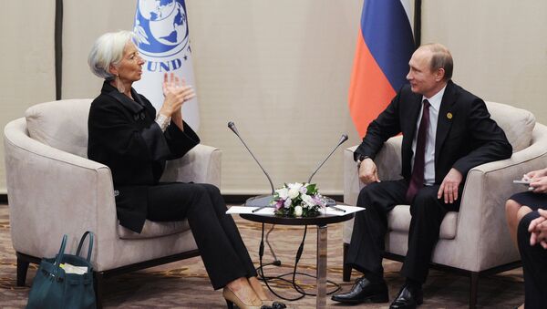 Russian President Vladimir Putin and IMF Managing Director Christine Lagarde during their meeting on the sidelines of the G20 summit in Antalya, Turkey, November 15, 2015. - Sputnik International