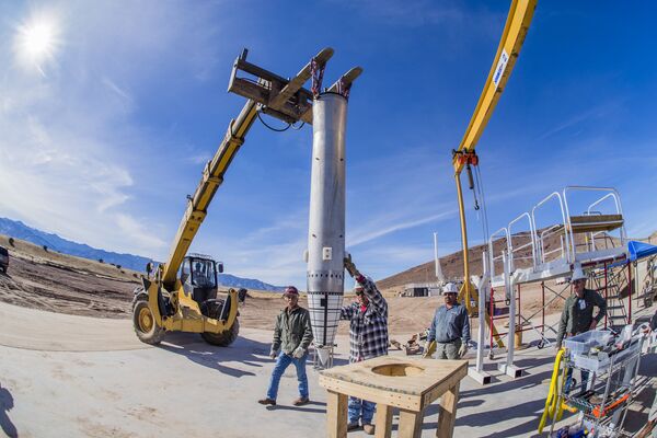 A worker steadies a mock B61-12 as it begins its trip via forklift to the barrel of Sandia National Laboratories’ Davis gun, which will fire the test assembly into a pool of water as part of experiments for the B61-12 Life Extension Program A worker steadies a mock B61-12 as it begins its trip via forklift to the barrel of Sandia National Laboratories’ Davis gun, which will fire the test assembly into a pool of water as part of experiments for the B61-12 Life Extension Program - Sputnik International