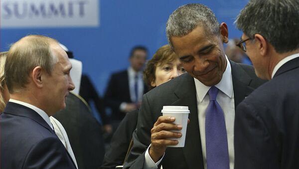 U.S. President Barack Obama , right, talks with Russian President Vladimir Putin, left, prior to a session of the G-20 Summit in Antalya, Turkey, Monday, Nov. 16, 2015 - Sputnik International