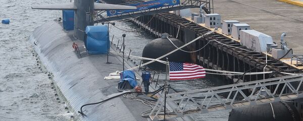 USS Chicago (SSN 721), a Los Angeles class fast-attack submarine, is anchored at Subic Bay port on August 6, 2015, after arriving on August 4 as part of its deployment in the Western Pacific USS Chicago (SSN 721), a Los Angeles class fast-attack submarine, is anchored at Subic Bay port on August 6, 2015, after arriving on August 4 as part of its deployment in the Western Pacific - Sputnik International