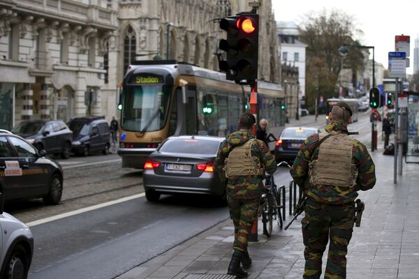 Belgian soldiers patrol in the streets, after security was tightened in Belgium following the Paris attacks, in Brussels, Belgium, November 17, 2015 Belgian soldiers patrol in the streets, after security was tightened in Belgium following the Paris attacks, in Brussels, Belgium, November 17, 2015 - Sputnik International