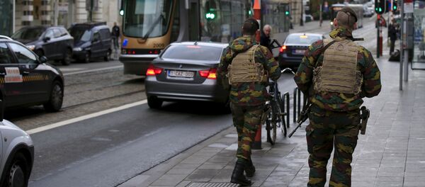 Belgian soldiers patrol in the streets, after security was tightened in Belgium following the Paris attacks, in Brussels, Belgium, November 17, 2015 - Sputnik International