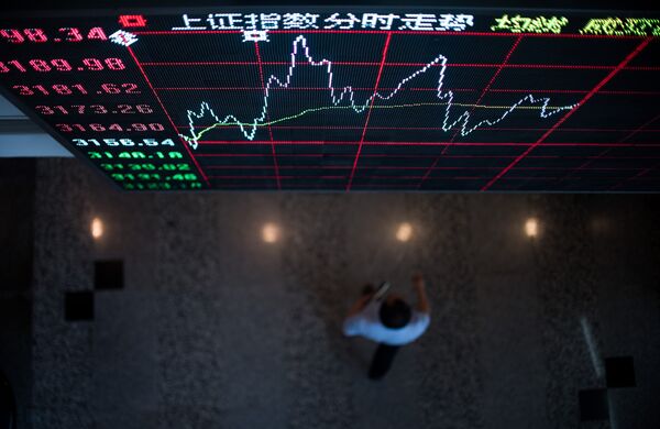 A board shows the stock movements inside the Shanghai Stock Exchange in the Lujiazui Financial district of Shanghai on September 22, 2015 A board shows the stock movements inside the Shanghai Stock Exchange in the Lujiazui Financial district of Shanghai on September 22, 2015 - Sputnik International