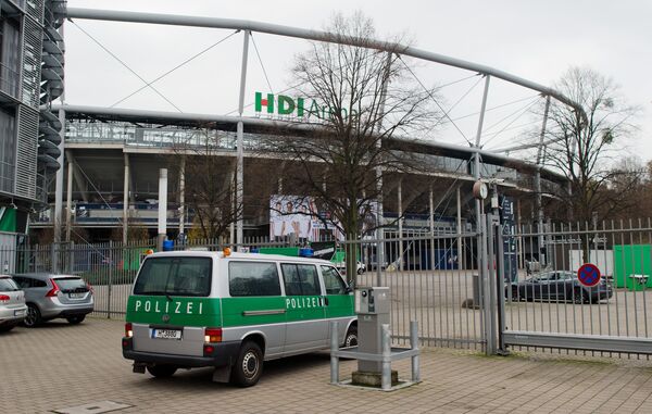 A police car parked in front of the HDI Arena in Hannover, Germany, Monday Nov. 16, 2015. There are increased security measures in place following Friday's terror attacks that killed scores of people in Paris. A police car parked in front of the HDI Arena in Hannover, Germany, Monday Nov. 16, 2015. There are increased security measures in place following Friday's terror attacks that killed scores of people in Paris. - Sputnik International