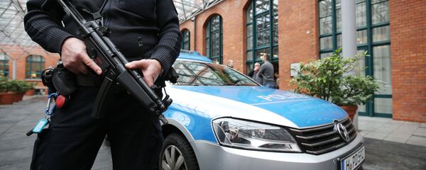 Police guard outside the Netherland's team hotel ahead of the friendly soccer match between Germany and the Netherlands in Hannover, Germany, Tuesday Nov. 17, 2015. Following the attacks in Paris, security measures have been increased for the match. Police guard outside the Netherland's team hotel ahead of the friendly soccer match between Germany and the Netherlands in Hannover, Germany, Tuesday Nov. 17, 2015. Following the attacks in Paris, security measures have been increased for the match. - Sputnik International