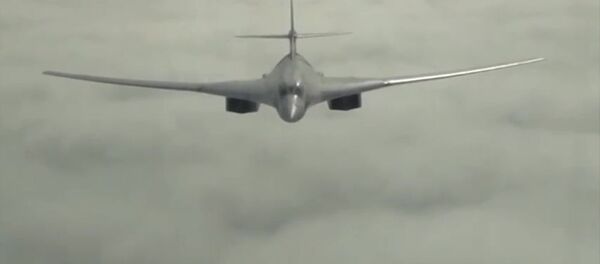 A Russian Tupolev 160 long-range bomber during a mission to launch an air strike on the Islamic State infrastructure in Syria - Sputnik International
