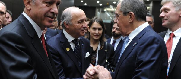 Foreground, from left: Turkish President Recep Tayyip Erdogan, French Foreign Minister Laurent Fabius, Russian Foreign Minister Sergei Lavrov, and Kremlin Deputy Chief of Staff and Russian Presidential Press Secretary Dmitry Peskov during the G20 summit in Antalya, Turkey, November 15, 2015. - Sputnik International